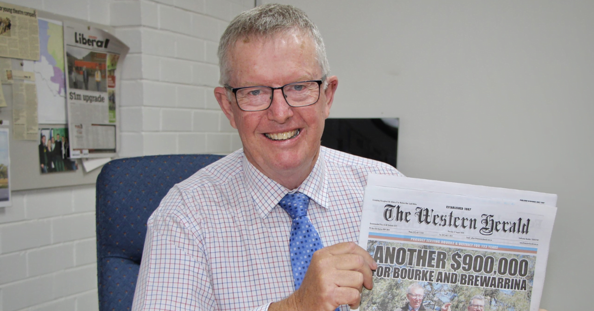 Mark Coulton MP holding the Western Herald